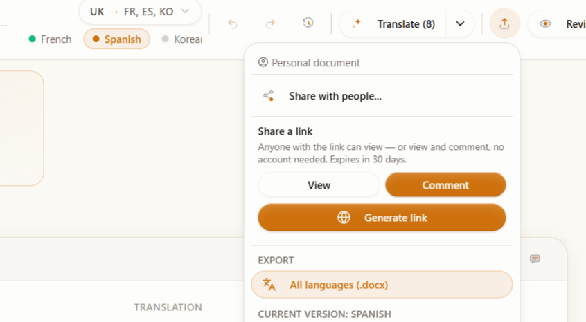 The editor header showing the “EN → DE, FR, ES” language pill and the version tab bar under the document title.